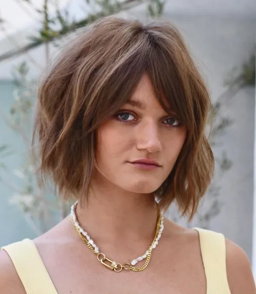 Textured Bob Haircut with Curtain Bangs