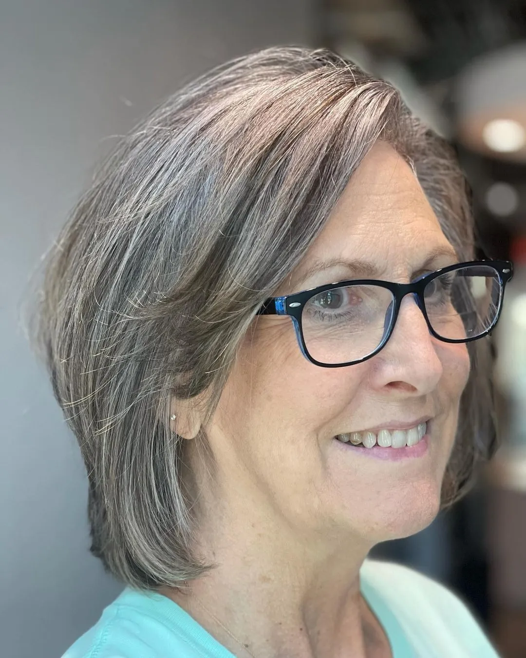 Short Bob Hairstyle for Women with Gray Hair and Glasses