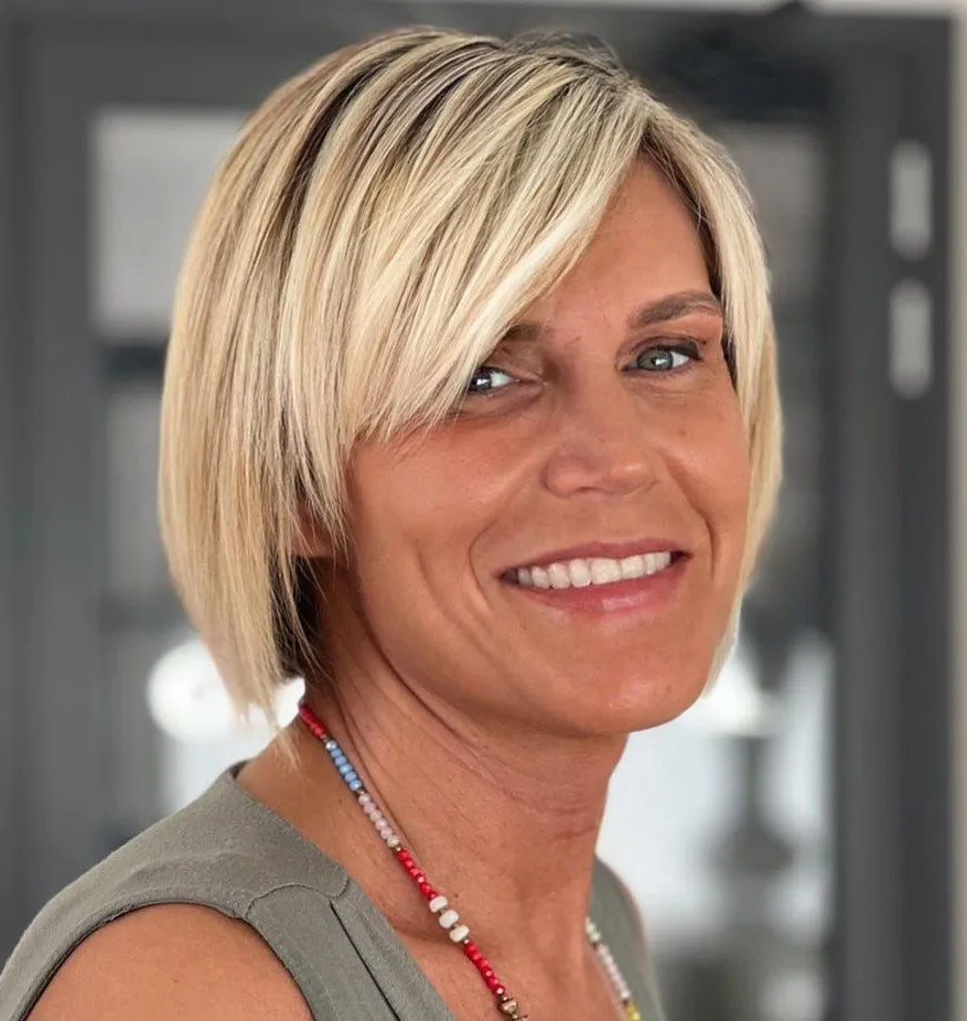 Short Blonde Bob with Side Bangs for Angular Faces