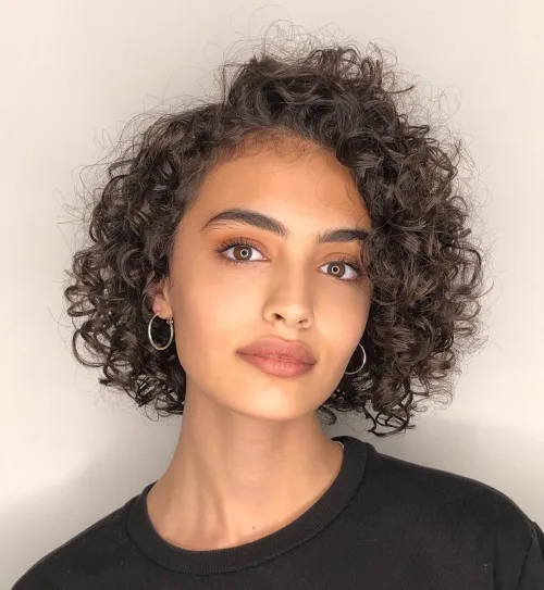 Short Curly Hairstyle with Deep Side Part