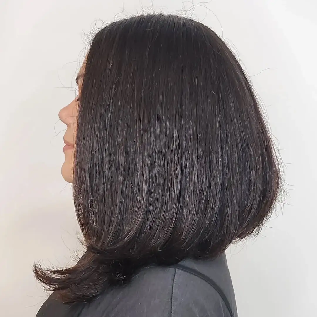 Shoulder-Grazing Stacked Haircut Thick Hair Long Stacked Bob