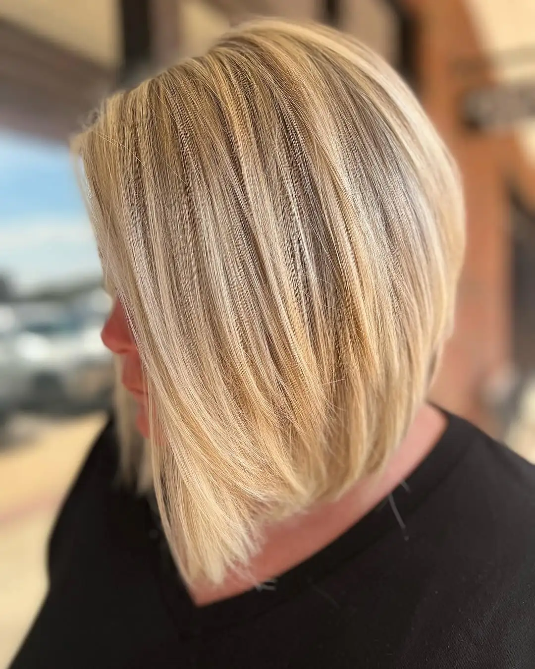 Angled Cut with Layered Ends Angled Long Stacked Bob