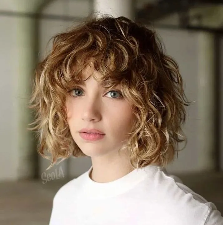 Beach Wave Perm Bob with Bangs and Balayage