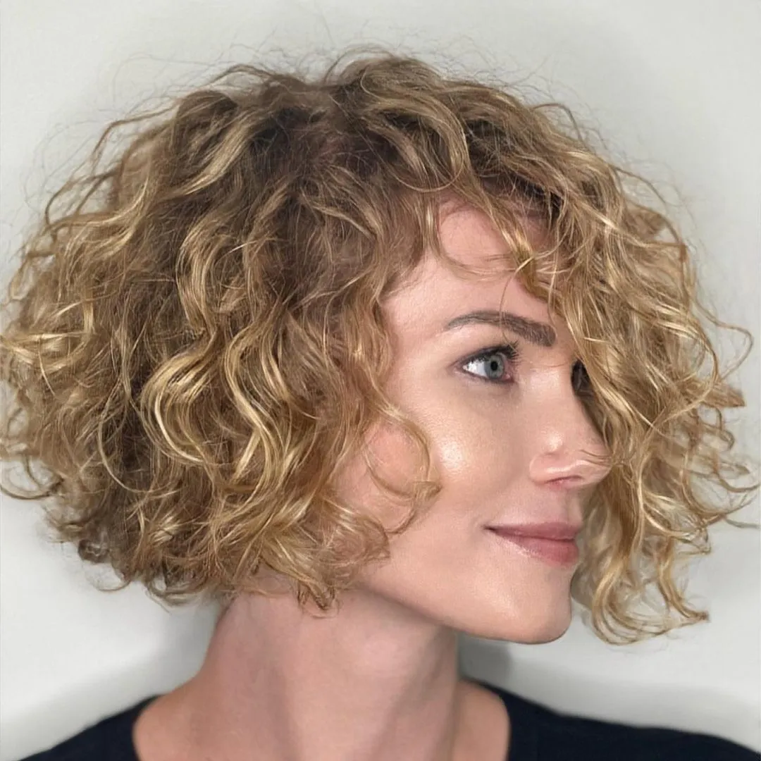 Honey Blonde Chin Length Curly Bob