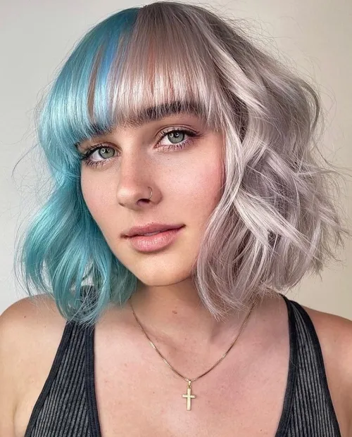 Soft Waves and Blunt Bangs Curled Bob with Eyebrow Skimming Bangs and Split Color