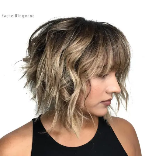 Wavy Textured Haircut with Long See-Through Bangs Edgy Choppy Bob with Bangs