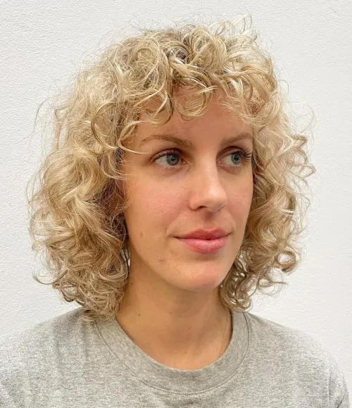 Short Blonde Shag with Choppy Layers Blonde Shaggy Bob for Natural Curls