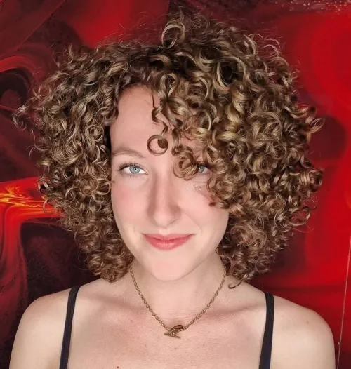 Shaggy Curly Bob with Side Bangs Modern Shaggy Bob for Classic Curls