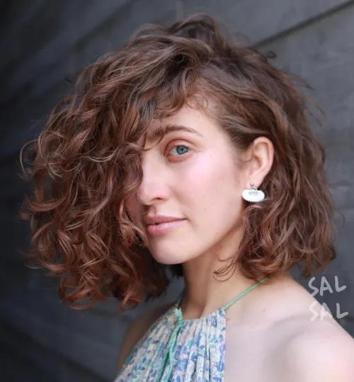 Side-Parted Layered Bob for Natural Curls Mesmerizing Side Parted Curly Style