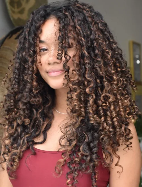 Long Black Coils with Caramel Highlights Dark Layered Corkscrews with Highlights