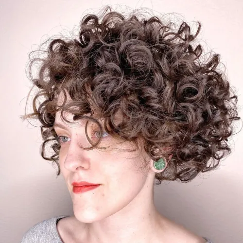 Short Cut with Big Curls and See-Through Bangs Short Curly Bob with Face Framing Layers