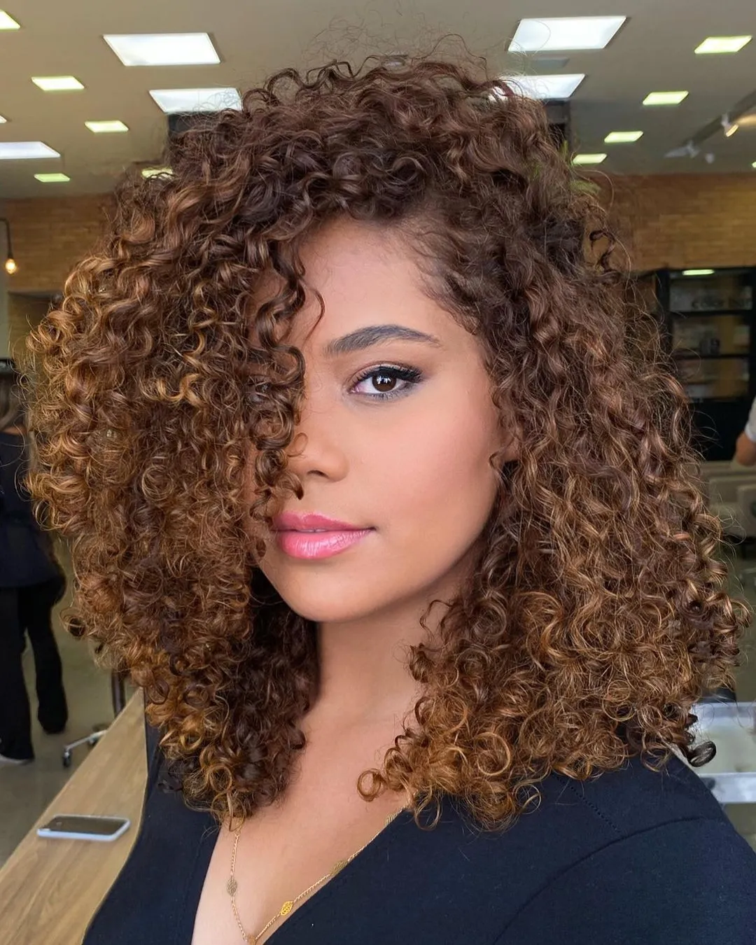 Golden Brown Babylights on Tight Curls