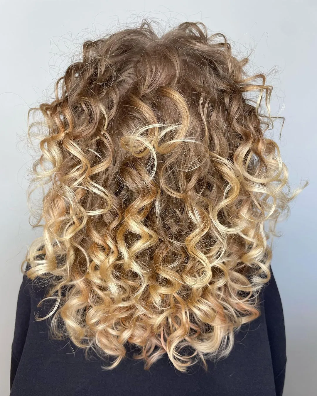 Caramel Ombre Highlights on Light Brown Curly Hair