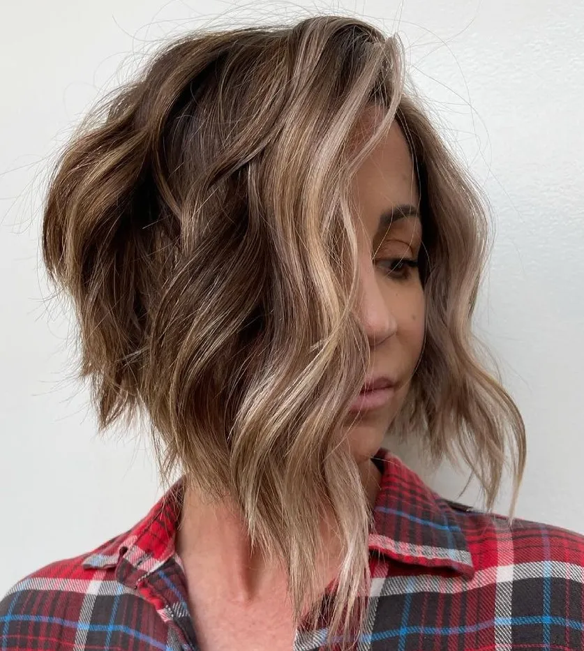 Stacked Angled Curly Bob with Face Framing Balayage