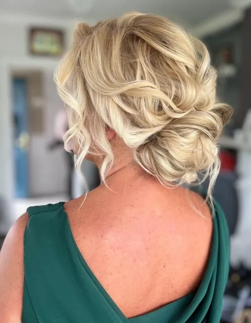 Elegant Bun Updo with Face Framing Pieces
