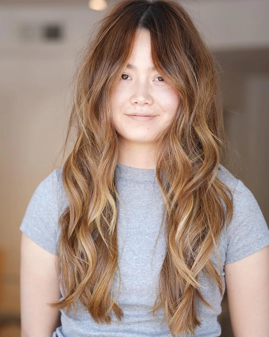 Long Seamless Layers with Ombre Effect Caramel Ombre on Wavy Cinnamon Locks