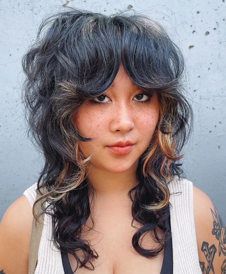 Razor-Cut Shag with Curtain Bangs Shaggy Hairdo with Flipped Curtain Bangs