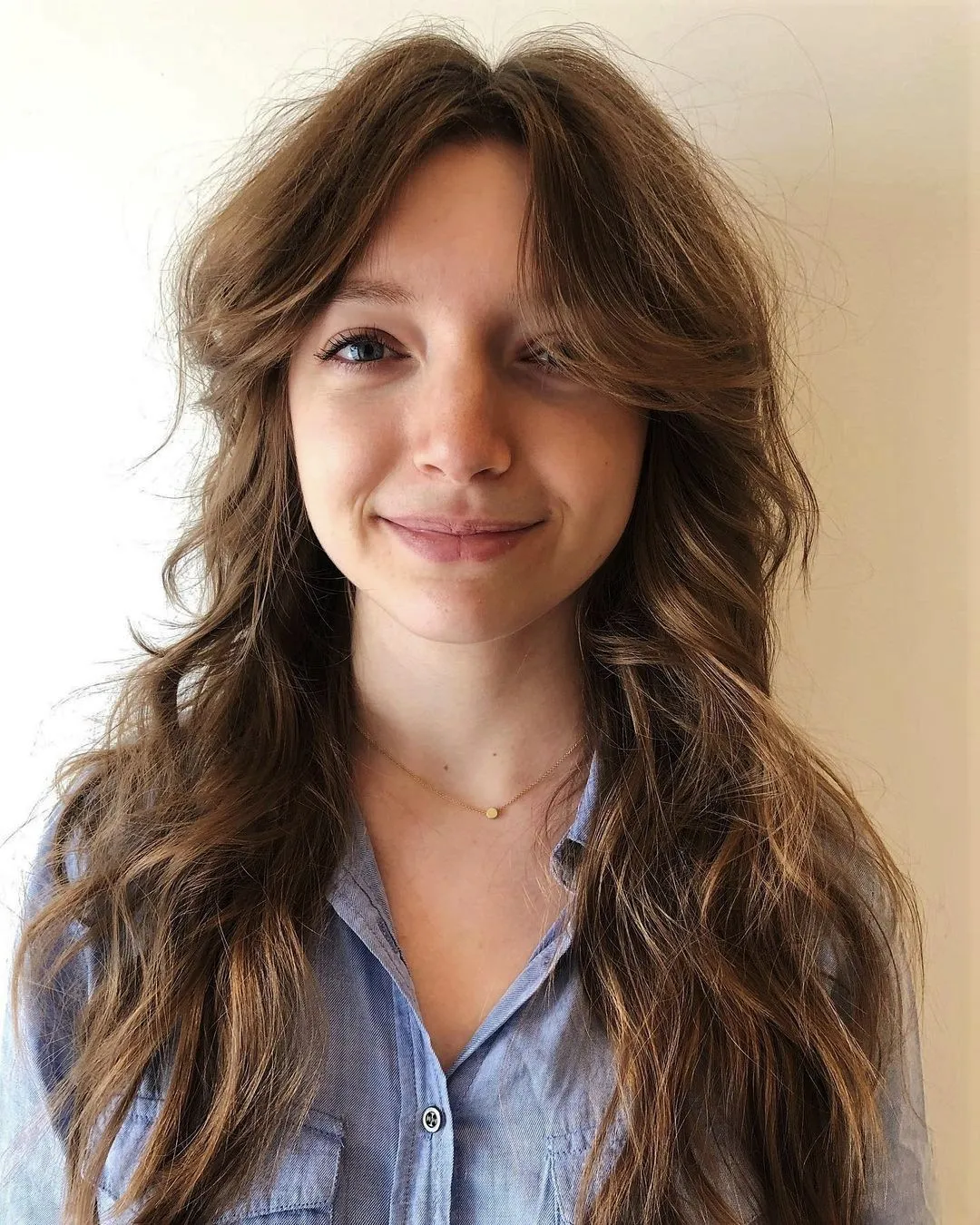 Soft Shaggy Haircut for Long Waves Soft Shag for Long Wavy Hair and Round Face Shape