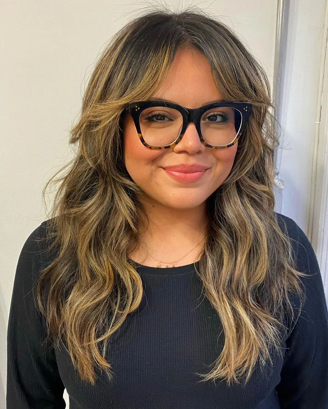 Shaggy Waves and Glasses Layered Cut with Curtain Bangs for Round Face