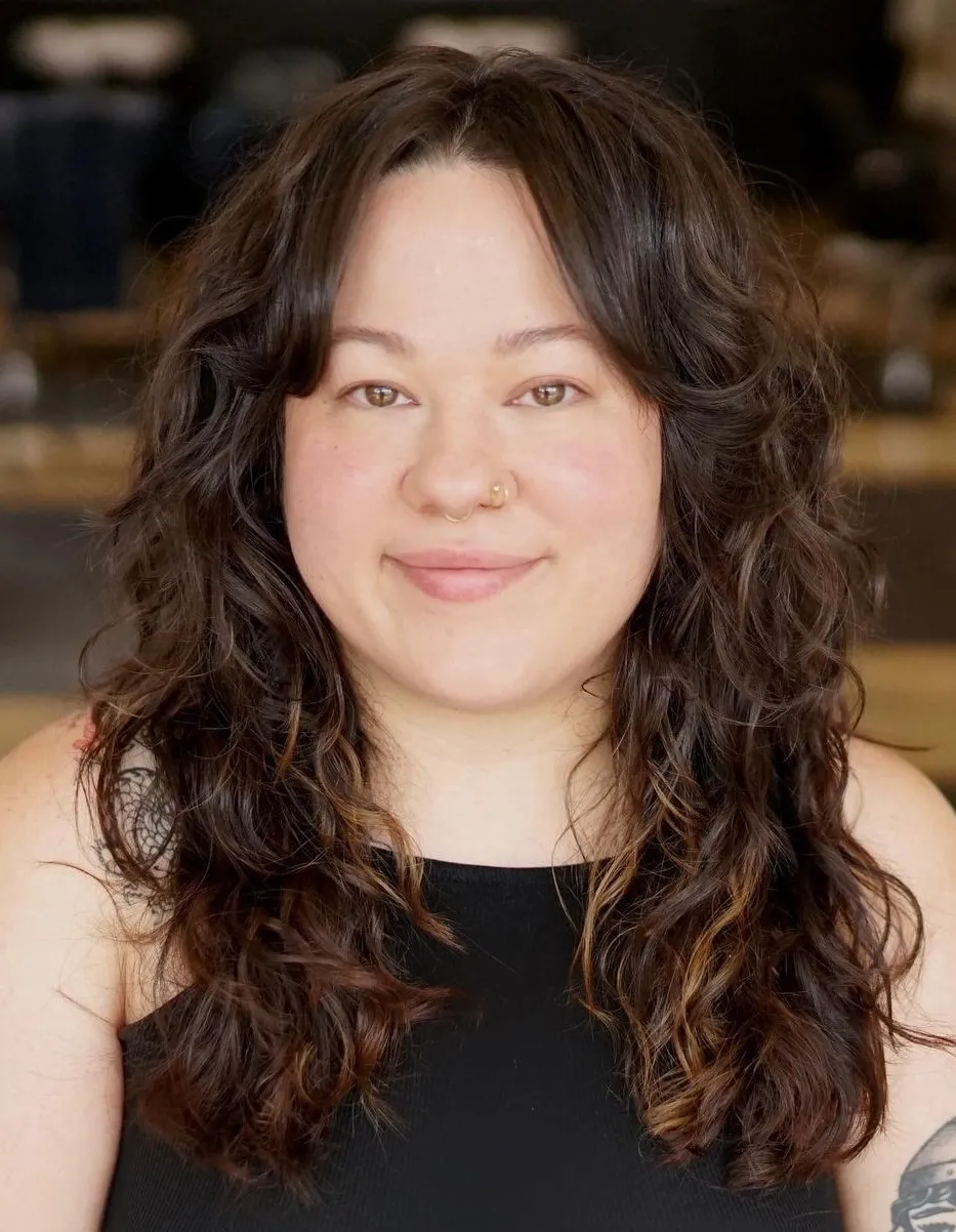 Naturally Wavy Shag Wavy Hair with Highlights and Curtain Bangs