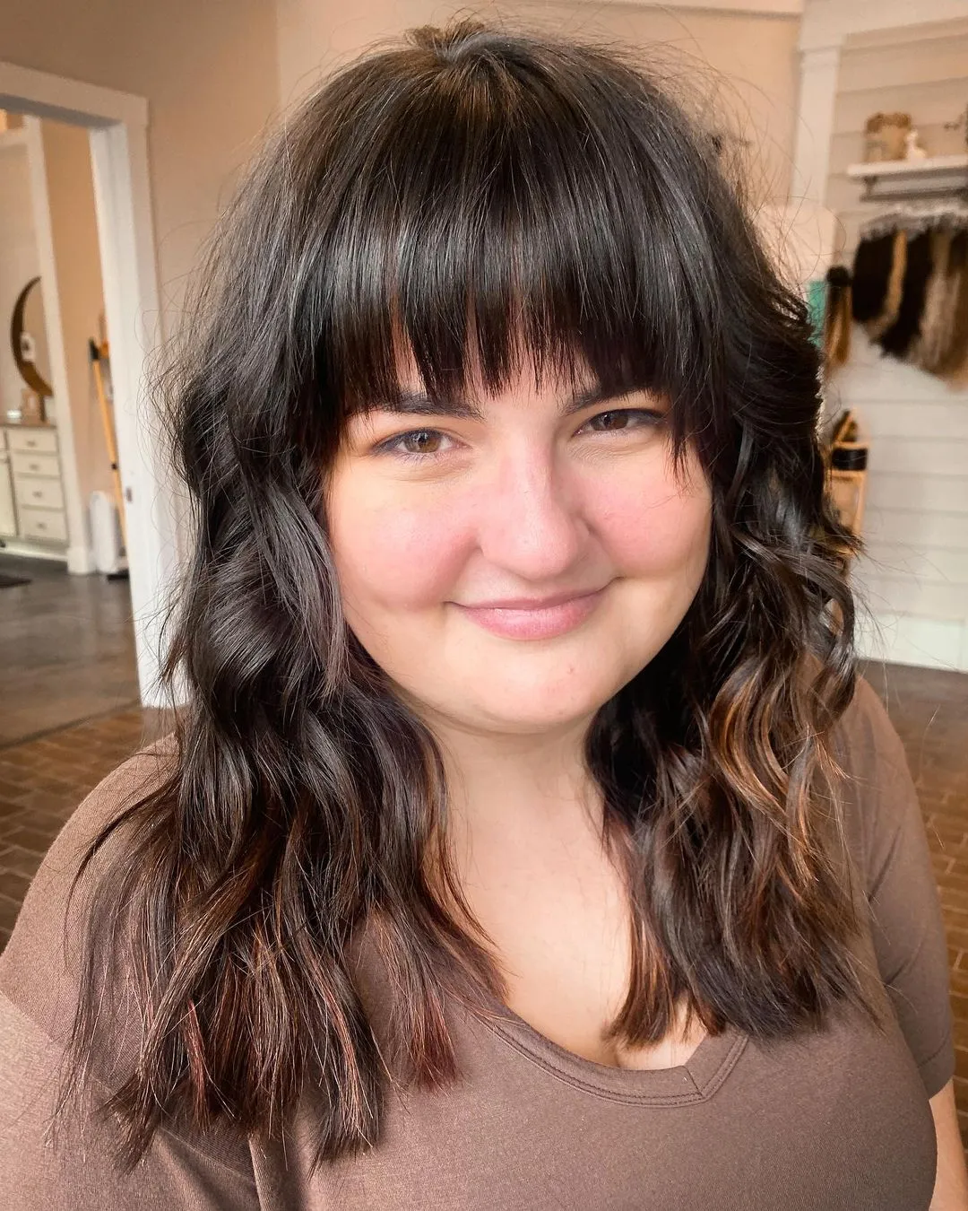 Medium-Length Waves with Eyeskimming Bangs Wavy Hair and Straight Fringe Combo