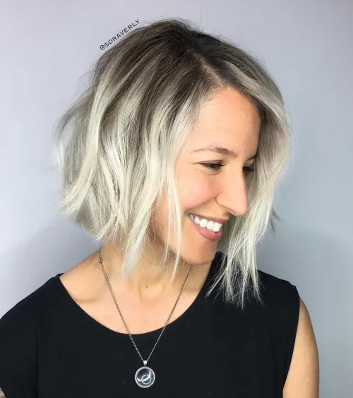 Bleached Shaggy Bob With Root Fade