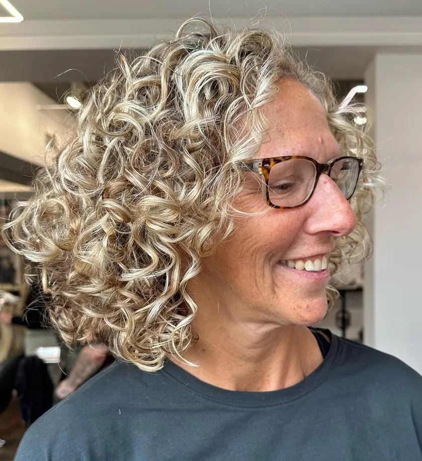 Curly Bob with Highlights and Lowlights Short Curly Hairstyle for Saggy Jawline