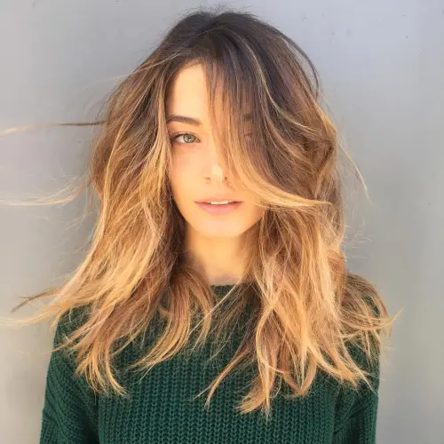 Long Tousled Caramel Balayage Hairstyle