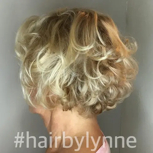 60 Elegant Hairstyles for Women Over 60 to Match Every Preference 19 Short Curly Blonde Hairstyle For Over 60