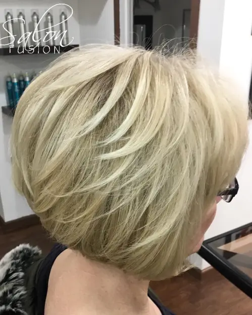 60 Elegant Hairstyles for Women Over 60 to Match Every Preference 10 Blonde Feathered Bob For Thin Hair