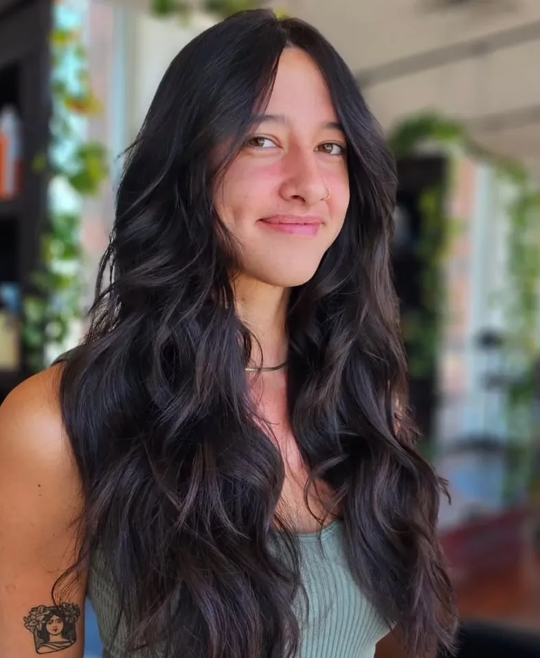 Long Waves with Curtain Bangs Long Wavy Hairstyle for Long Oblong Faces