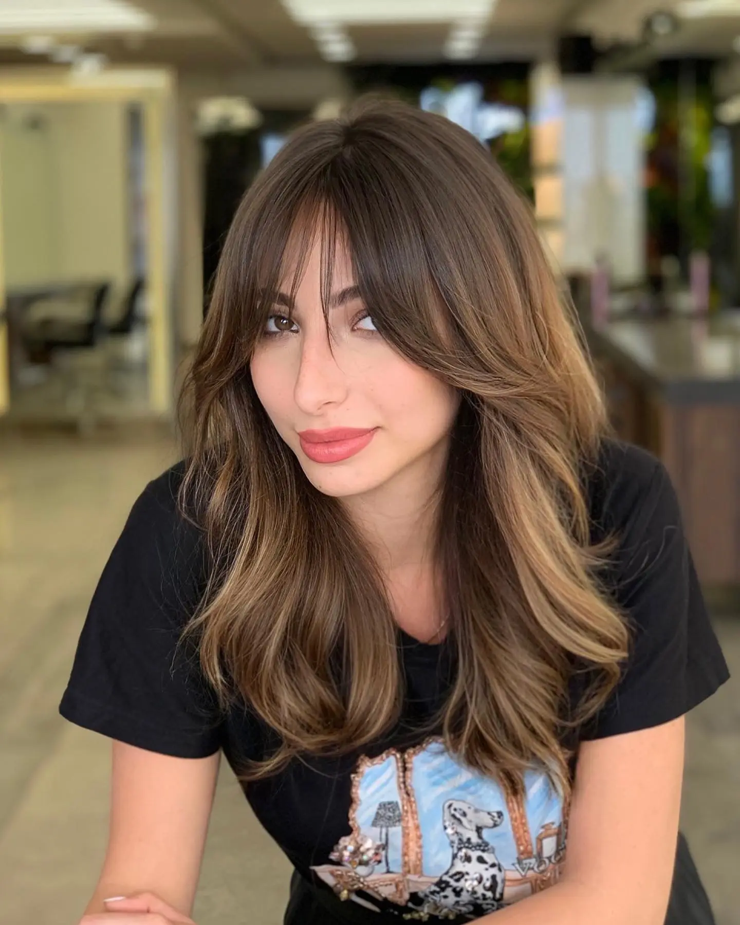 Thick Brown Layers with Curtain Bangs