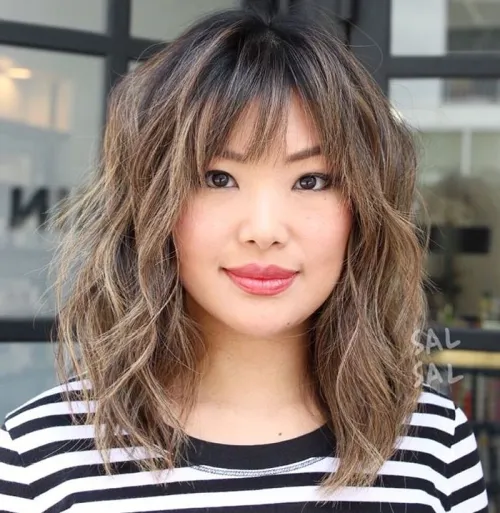 Medium Bronde Balayage Shag With Bangs