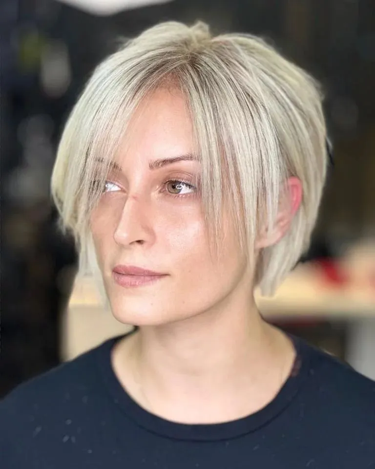 Pixie Bob with Long Side Bangs Blonde Pixie Bob with Long Framing Bangs