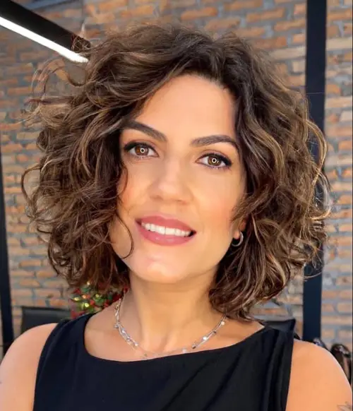 30 Hairstyles That Can Shave a Decade Off Your Appearance 10 Youthful Scrunched Wavy Bob