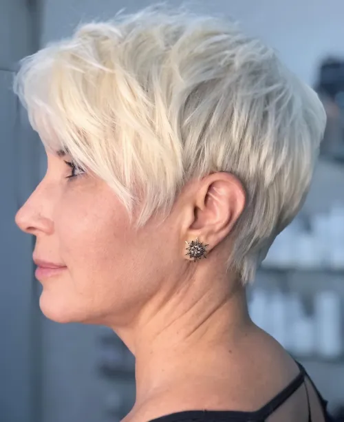 30 Hairstyles That Can Shave a Decade Off Your Appearance 9 Midi Shag with Layered Curtain Bangs