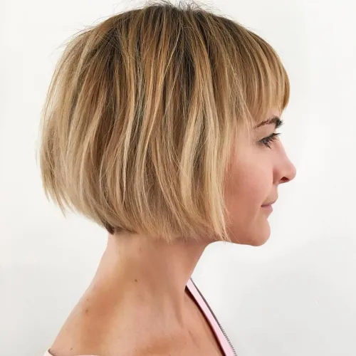 30 Hairstyles That Can Shave a Decade Off Your Appearance 28 Short Blonde Bob with Bangs