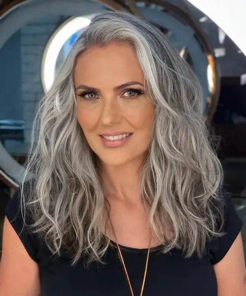 30 Hairstyles That Can Shave a Decade Off Your Appearance 25 Gray Brown Tousled Waves