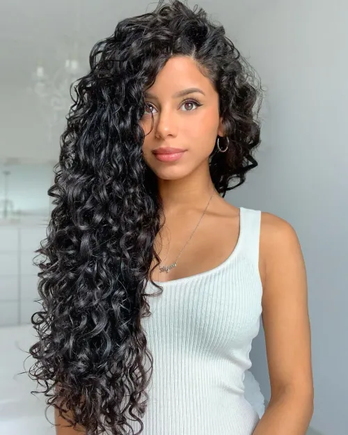 12 Different Hair Types: Identifying and Styling Yours 9 Woman with 3A Type of Hair