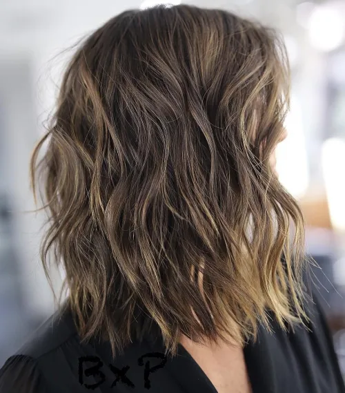 80 Stunning Medium-Length Hairstyles for Thick Hair 43 Messy Wavy Lob With Subtle Highlights