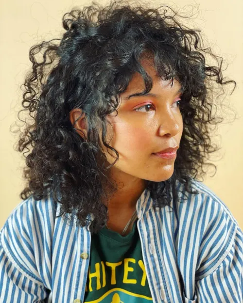 Side Parted Curly Haircut