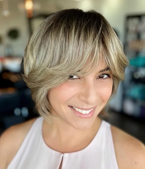 Jaw Length Blonde Wedge Cut with Shadow Roots