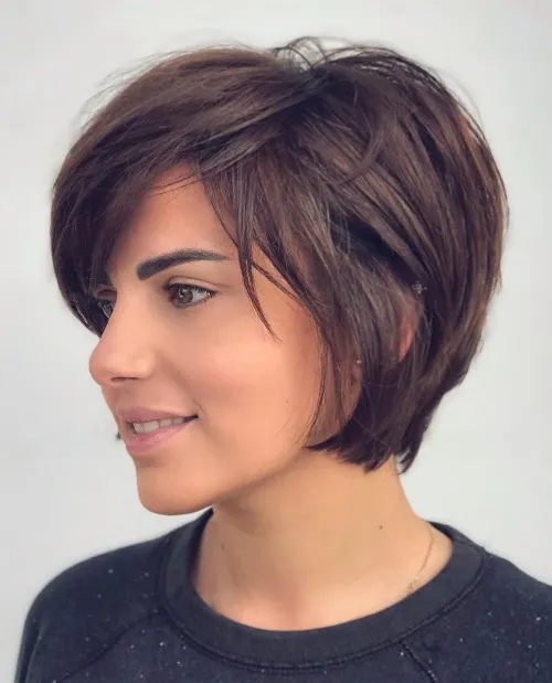 Thick Hair Bixie with Stacked Layers and Side Bangs