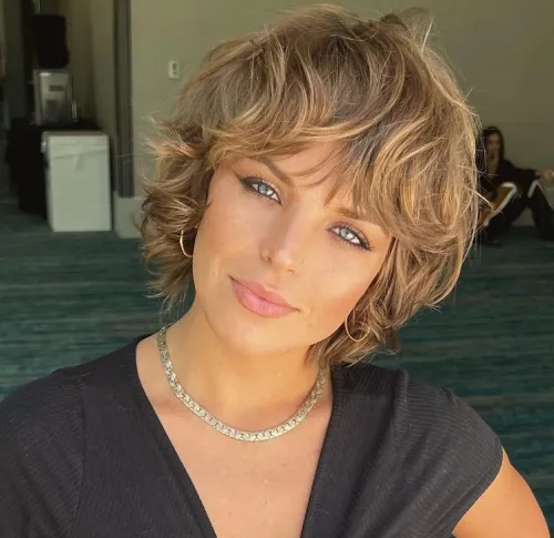 Short Shaggy Haircut with Honey Blonde Highlights