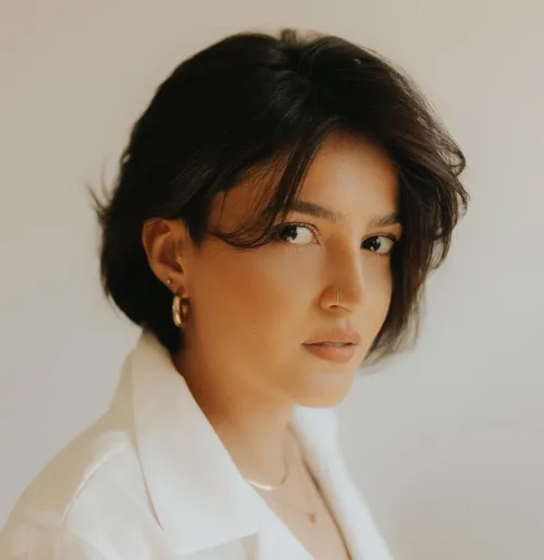 Short Feathered Bob with Wispy Curtain Bangs