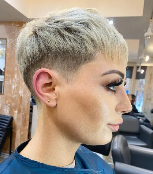 Short Blonde Pixie with Low Fade and Bangs