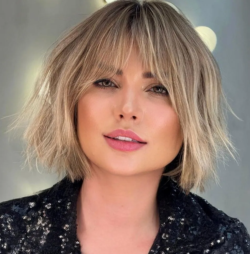 Messy Bob with Feathery Bangs Wispy Bob with Arched Bangs