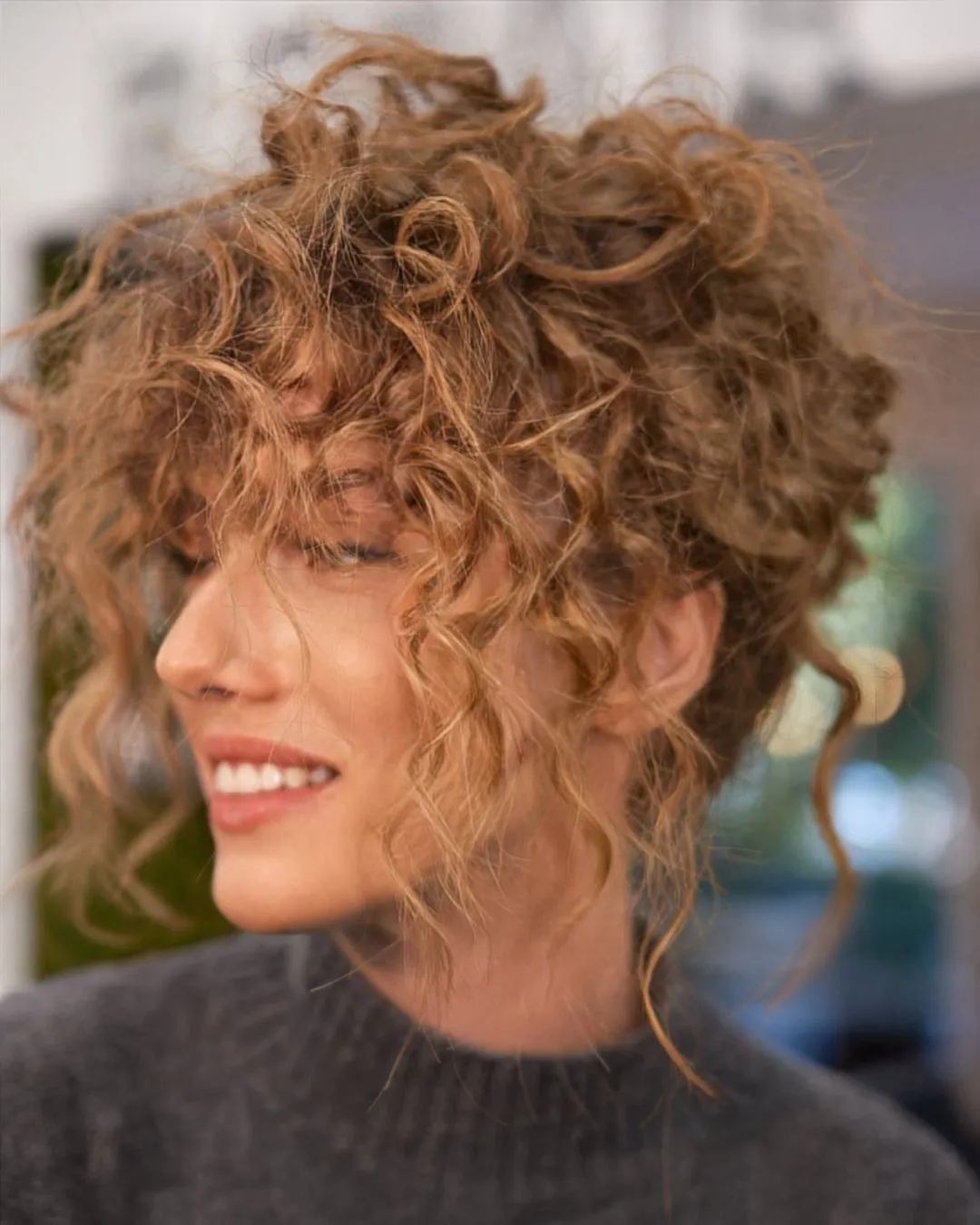 Messy Textured Updo for Natural Curls