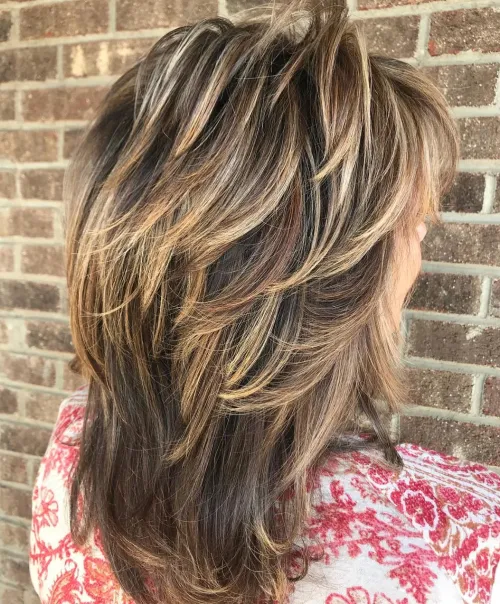 60 Essential Shag Hairstyles for Every Hair Type and Length 7 Medium Feathered Cut With Bronde Balayage