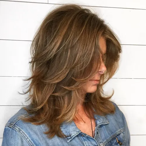 60 Essential Shag Hairstyles for Every Hair Type and Length 9 Medium Shag With Peek-A-Boo Bangs